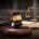 Gavel resting on a desk with a book and balance in the background